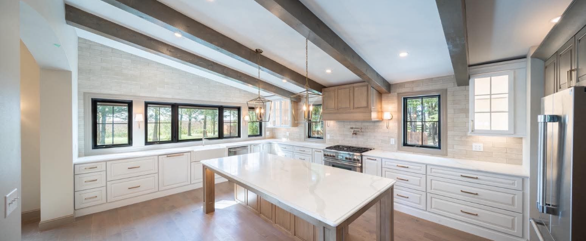 Integrity Construction team completing a kitchen remodel project in western Kansas